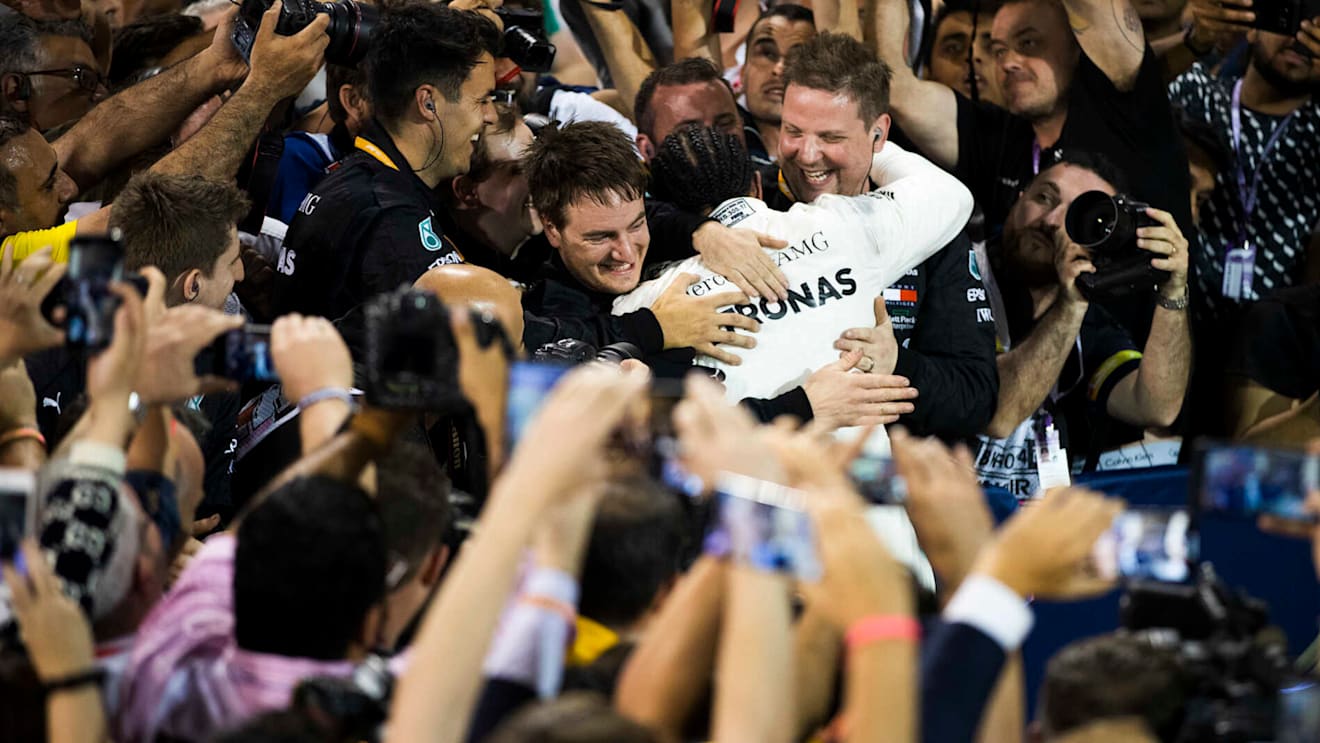 BAHRAIN INTERNATIONAL CIRCUIT, BAHRAIN - MARCH 31: Lewis Hamilton, Mercedes AMG F1, 1st position, celebrates with his team during the Bahrain GP at Bahrain International Circuit on March 31, 2019 in Bahrain International Circuit, Bahrain. (Photo by Glenn Dunbar / LAT Images)