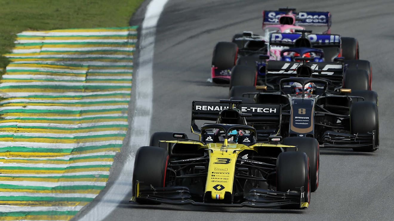 SAO PAULO, BRAZIL - NOVEMBER 17: Daniel Ricciardo of Australia driving the (3) Renault Sport Formula One Team RS19 leads Romain Grosjean of France driving the (8) Haas F1 Team VF-19 Ferrari on track during the F1 Grand Prix of Brazil at Autodromo Jose Carlos Pace on November 17, 2019 in Sao Paulo, Brazil. (Photo by Robert Cianflone/Getty Images)
