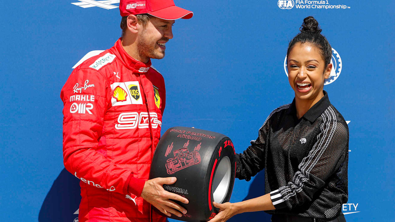 CIRCUIT GILLES-VILLENEUVE, CANADA - JUNE 08: Sebastian Vettel, Ferrari, is presented with his Pirelli Pole Position Award by actress Liza Koshy during the Canadian GP at Circuit Gilles-Villeneuve on June 08, 2019 in Circuit Gilles-Villeneuve, Canada. (Photo by Steven Tee / LAT Images)