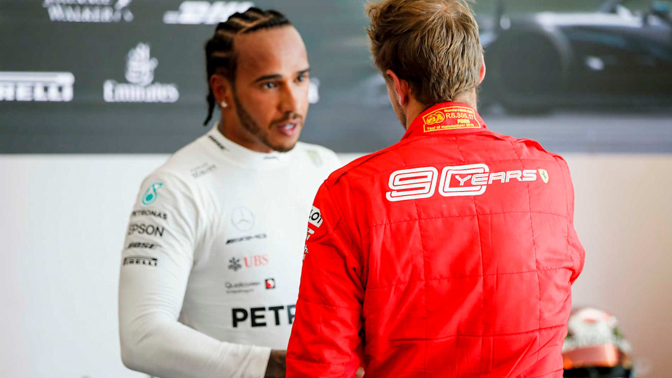 CIRCUIT GILLES-VILLENEUVE, CANADA - JUNE 09: Lewis Hamilton, Mercedes AMG F1, 1st position, shakes hands with Sebastian Vettel, Ferrari, 2nd position, after the race during the Canadian GP at Circuit Gilles-Villeneuve on June 09, 2019 in Circuit Gilles-Villeneuve, Canada. (Photo by Steven Tee / LAT Images)