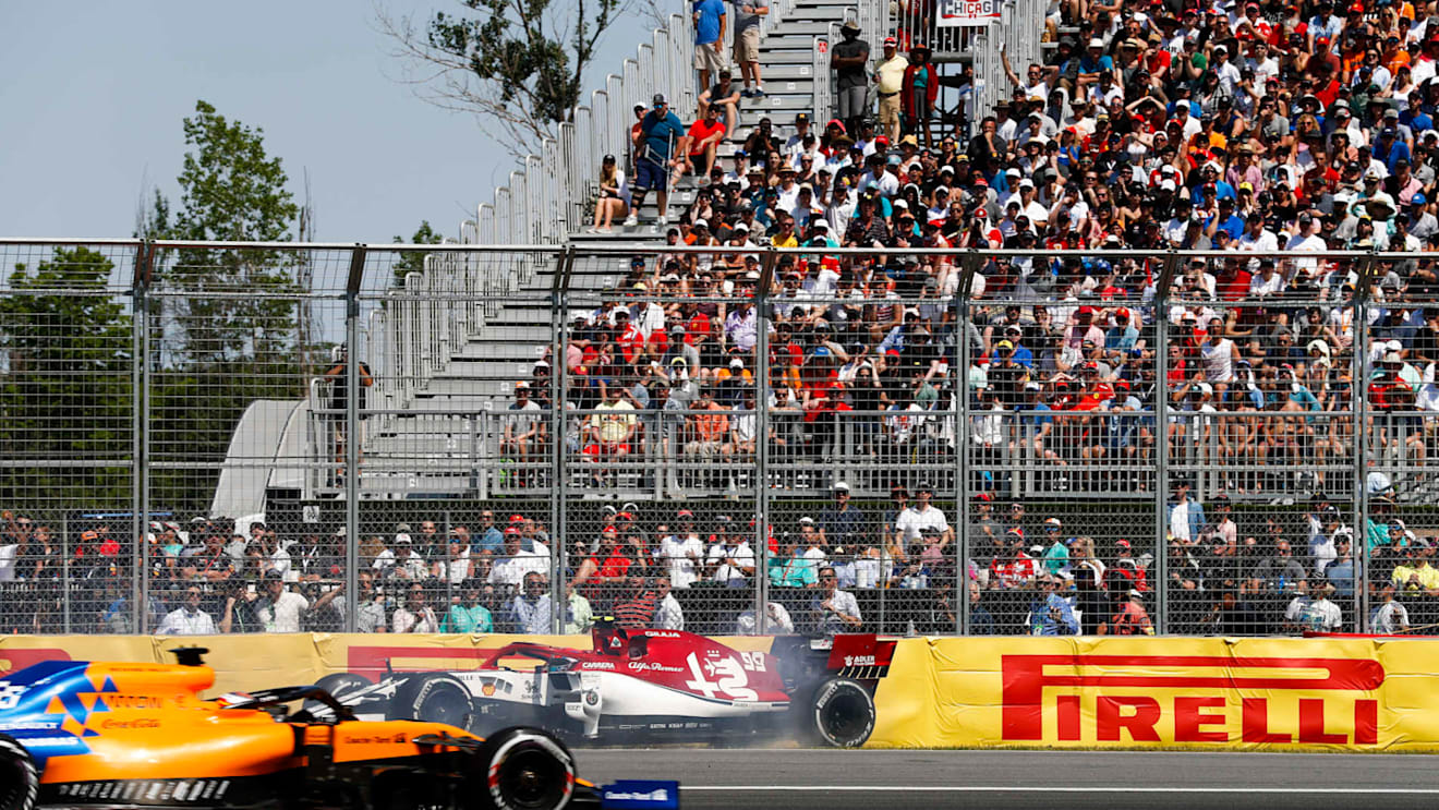 CIRCUIT GILLES-VILLENEUVE, CANADA - JUNE 09: Antonio Giovinazzi, Alfa Romeo Racing C38, spins as Carlos Sainz Jr., McLaren MCL34, passes during the Canadian GP at Circuit Gilles-Villeneuve on June 09, 2019 in Circuit Gilles-Villeneuve, Canada. (Photo by Glenn Dunbar / LAT Images)