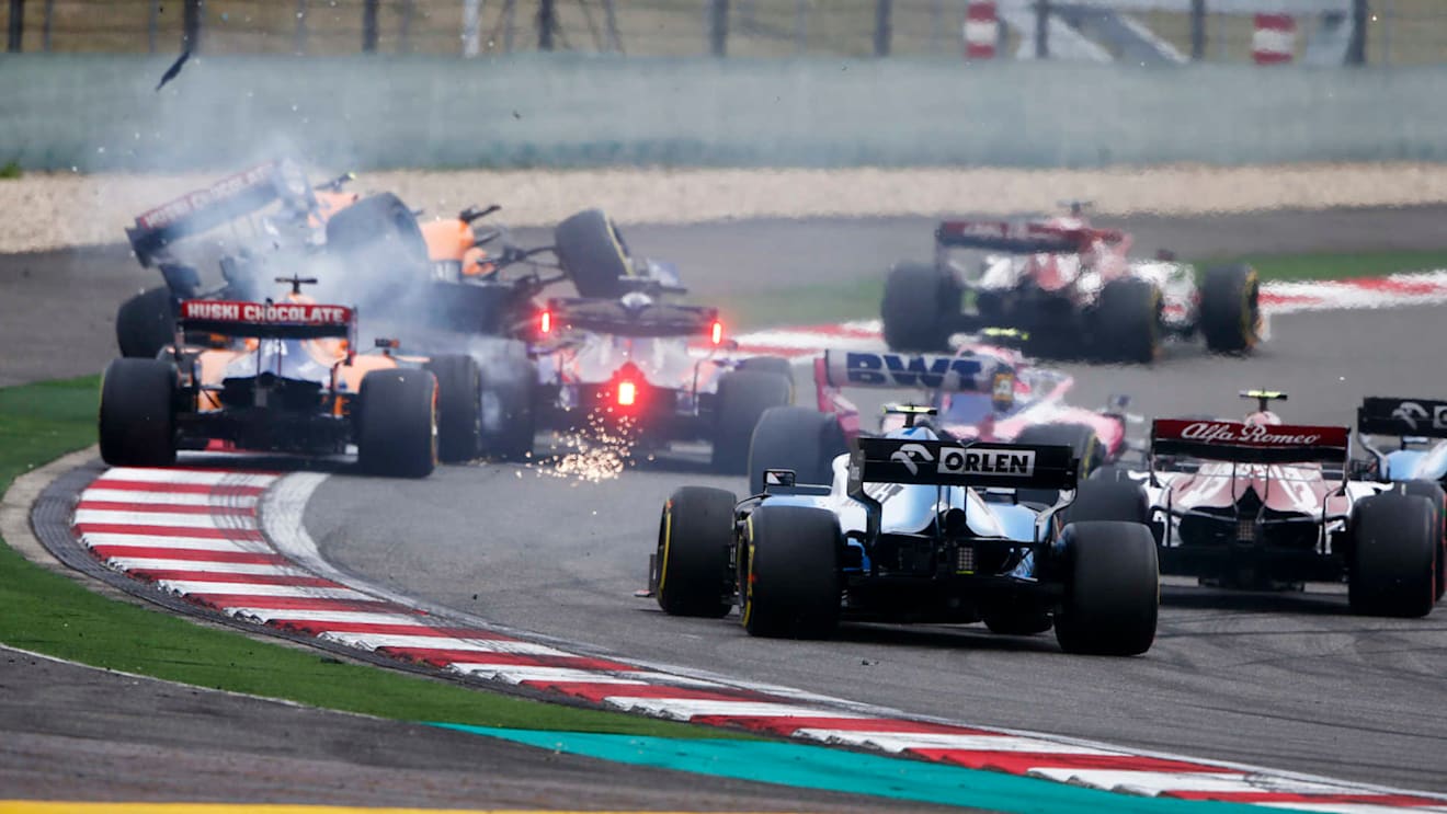 SHANGHAI INTERNATIONAL CIRCUIT, CHINA - APRIL 14: Lando Norris, McLaren MCL34 in the air after contact from Daniil Kvyat, Toro Rosso STR14 with Carlos Sainz Jr., McLaren MCL34, Lance Stroll, Racing Point RP19 and Robert Kubica, Williams FW42 behind during the Chinese GP at Shanghai International Circuit on April 14, 2019 in Shanghai International Circuit, China. (Photo by Andy Hone / LAT Images)