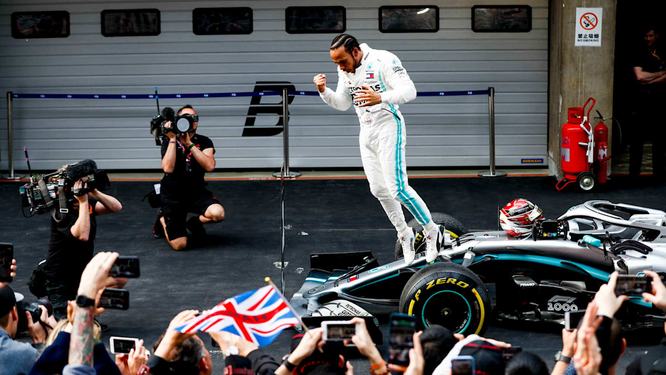 SHANGHAI INTERNATIONAL CIRCUIT, CHINA - APRIL 14: Lewis Hamilton, Mercedes AMG F1 celebrates in Parc Ferme during the Chinese GP at Shanghai International Circuit on April 14, 2019 in Shanghai International Circuit, China. (Photo by Glenn Dunbar / LAT Images)