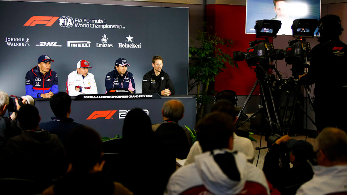 SHANGHAI INTERNATIONAL CIRCUIT, CHINA - APRIL 11: Alexander Albon, Toro Rosso, Kimi Raikkonen, Alfa Romeo Racing, Sergio Perez, Racing Point and Romain Grosjean, Haas F1 in Press Conference during the Chinese GP at Shanghai International Circuit on April 11, 2019 in Shanghai International Circuit, China. (Photo by Andy Hone / LAT Images)
