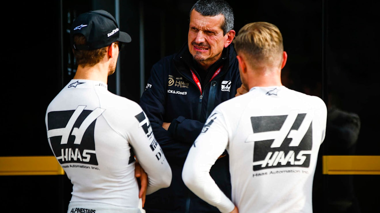 SHANGHAI INTERNATIONAL CIRCUIT, CHINA - APRIL 13: Romain Grosjean, Haas F1, Guenther Steiner, Team Principal, Haas F1, and Kevin Magnussen, Haas F1 during the Chinese GP at Shanghai International Circuit on April 13, 2019 in Shanghai International Circuit, China. (Photo by Andy Hone / LAT Images)