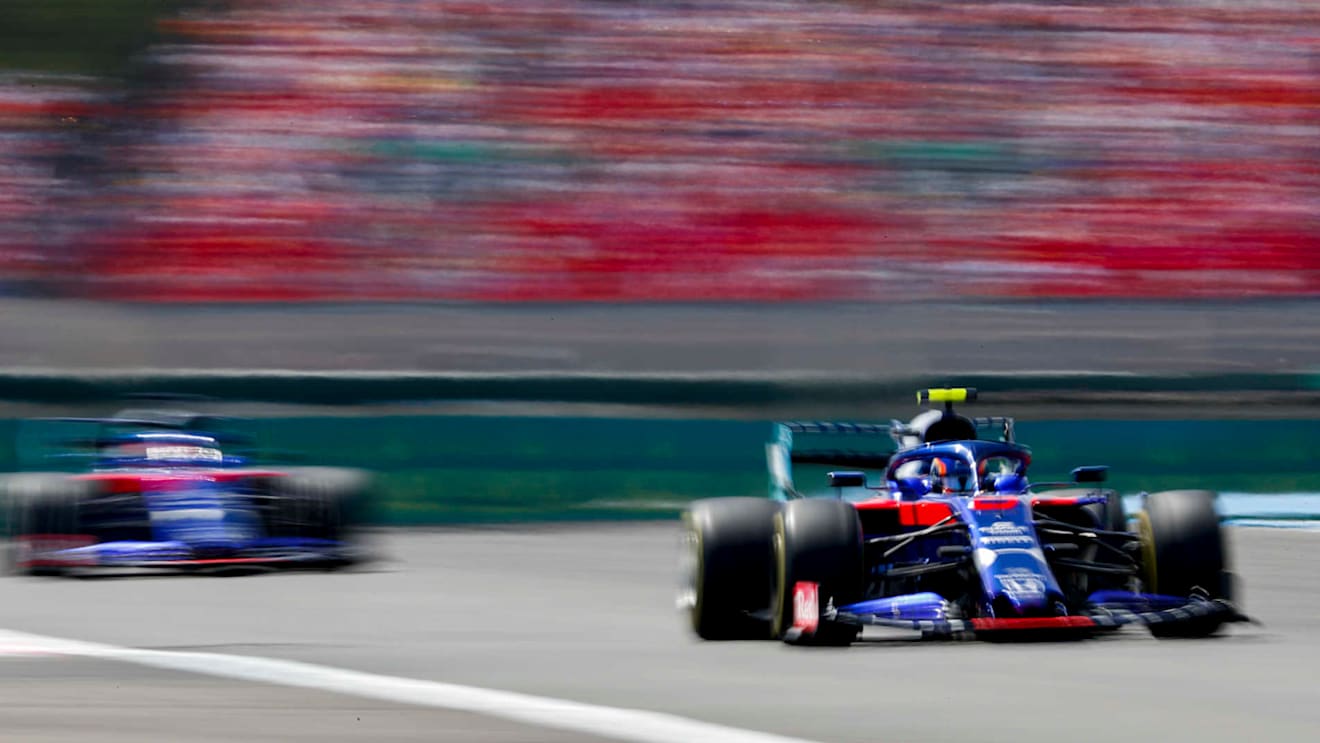 CIRCUIT PAUL RICARD, FRANCE - JUNE 23: Alexander Albon, Toro Rosso STR14, leads Daniil Kvyat, Toro Rosso STR14 during the French GP at Circuit Paul Ricard on June 23, 2019 in Circuit Paul Ricard, France. (Photo by Glenn Dunbar / LAT Images)