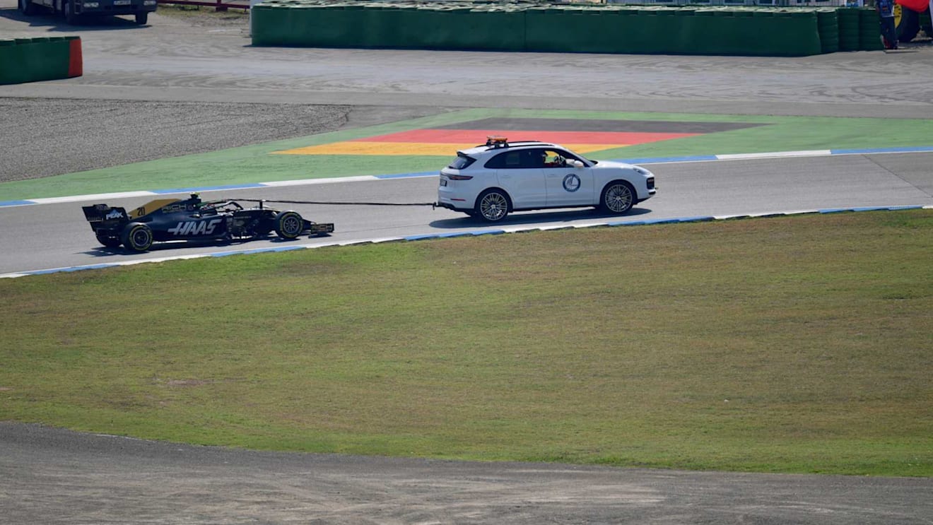 HOCKENHEIMRING, GERMANY - JULY 26: Kevin Magnussen, Haas VF-19, is towed back to the pits after stopping with a technical issue during FP1 during the German GP at Hockenheimring on July 26, 2019 in Hockenheimring, Germany. (Photo by Jerry Andre / LAT Images)