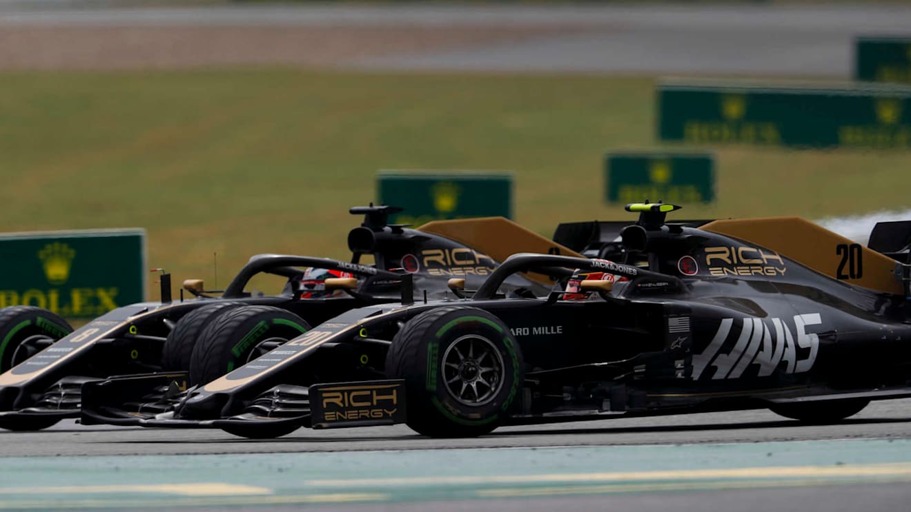 HOCKENHEIMRING, GERMANY - JULY 28: Kevin Magnussen, Haas VF-19 and Romain Grosjean, Haas VF-19 battle during the German GP at Hockenheimring on July 28, 2019 in Hockenheimring, Germany. (Photo by Zak Mauger / LAT Images)
