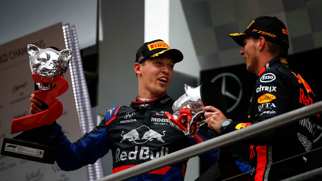 HOCKENHEIMRING, GERMANY - JULY 28: Daniil Kvyat, Toro Rosso, 3rd position, on the podium with Max Verstappen, Red Bull Racing, 1st position during the German GP at Hockenheimring on July 28, 2019 in Hockenheimring, Germany. (Photo by Andy Hone / LAT Images)