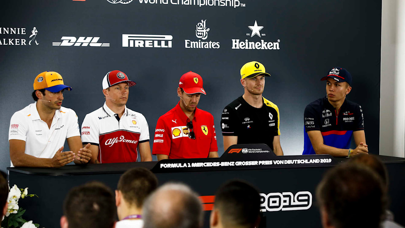 HOCKENHEIMRING, GERMANY - JULY 25: Carlos Sainz Jr, McLaren, Kimi Raikkonen, Alfa Romeo Racing, Sebastian Vettel, Ferrari, Nico Hulkenberg, Renault F1 Team andAlexander Albon, Toro Rosso in Press Conference during the German GP at Hockenheimring on July 25, 2019 in Hockenheimring, Germany. (Photo by Andy Hone / LAT Images)