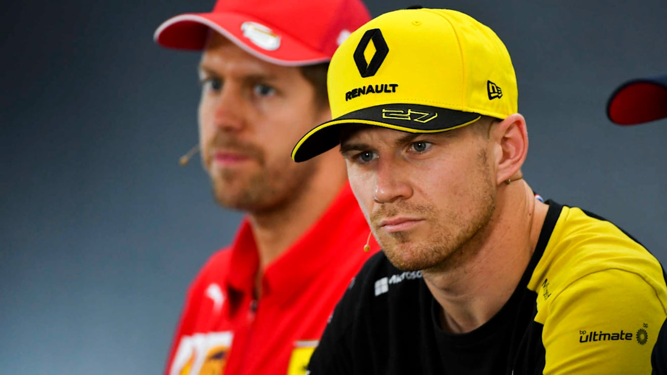 HOCKENHEIMRING, GERMANY - JULY 25: Nico Hulkenberg, Renault F1 Team and Sebastian Vettel, Ferrari In the Press Conference during the German GP at Hockenheimring on July 25, 2019 in Hockenheimring, Germany. (Photo by Mark Sutton / Sutton Images)