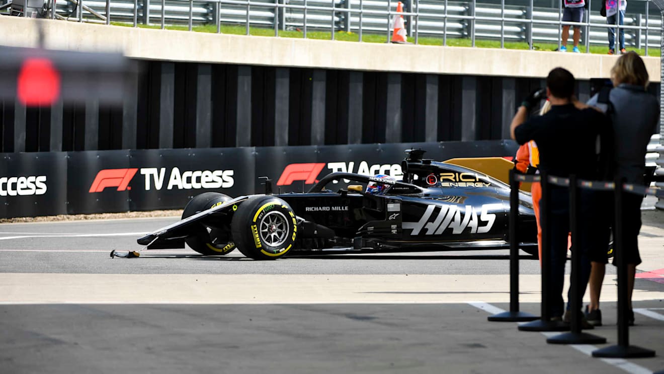 SILVERSTONE, UNITED KINGDOM - JULY 12: Romain Grosjean, Haas VF-19 crashes at the end of the pit lane during the British GP at Silverstone on July 12, 2019 in Silverstone, United Kingdom. (Photo by Mark Sutton / Sutton Images)