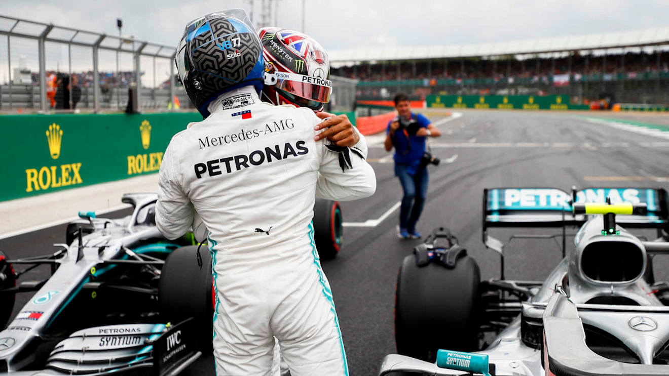 SILVERSTONE, UNITED KINGDOM - JULY 13: Pole Sitter Valtteri Bottas, Mercedes AMG F1 and Lewis Hamilton, Mercedes AMG F1 celebrate in Parc Ferme during the British GP at Silverstone on July 13, 2019 in Silverstone, United Kingdom. (Photo by Glenn Dunbar / LAT Images)