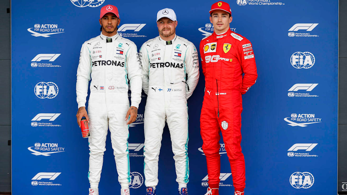 SILVERSTONE, UNITED KINGDOM - JULY 13: Top three Qualifiers Lewis Hamilton, Mercedes AMG F1, pole man Valtteri Bottas, Mercedes AMG F1, and Charles Leclerc, Ferrari during the British GP at Silverstone on July 13, 2019 in Silverstone, United Kingdom. (Photo by Zak Mauger / LAT Images)