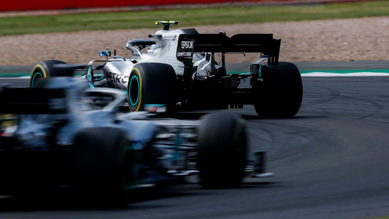 SILVERSTONE, UNITED KINGDOM - JULY 14: Valtteri Bottas, Mercedes AMG W10, leads Lewis Hamilton, Mercedes AMG F1 W10 during the British GP at Silverstone on July 14, 2019 in Silverstone, United Kingdom. (Photo by Zak Mauger / LAT Images)