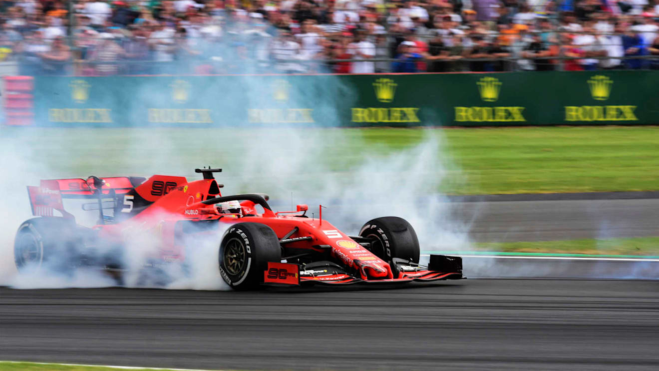 SILVERSTONE, UNITED KINGDOM - JULY 14: Sebastian Vettel, Ferrari SF90 running into the back of Max Verstappen, Red Bull Racing RB15 during the British GP at Silverstone on July 14, 2019 in Silverstone, United Kingdom. (Photo by Hasan Bratic / LAT Images)