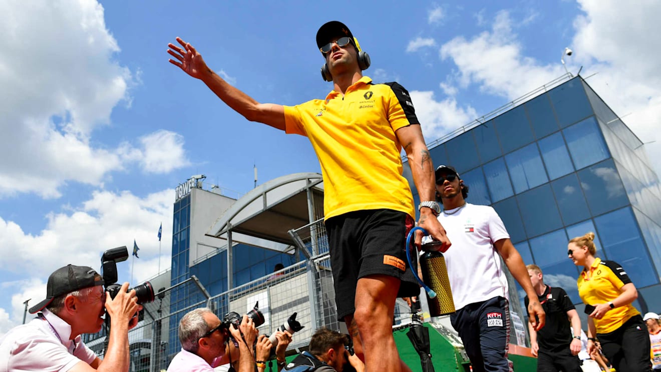 HUNGARORING, HUNGARY - AUGUST 04: Daniel Ricciardo, Renault F1 Team, and Lewis Hamilton, Mercedes AMG F1, in the drivers parade during the Hungarian GP at Hungaroring on August 04, 2019 in Hungaroring, Hungary. (Photo by Mark Sutton / Sutton Images)