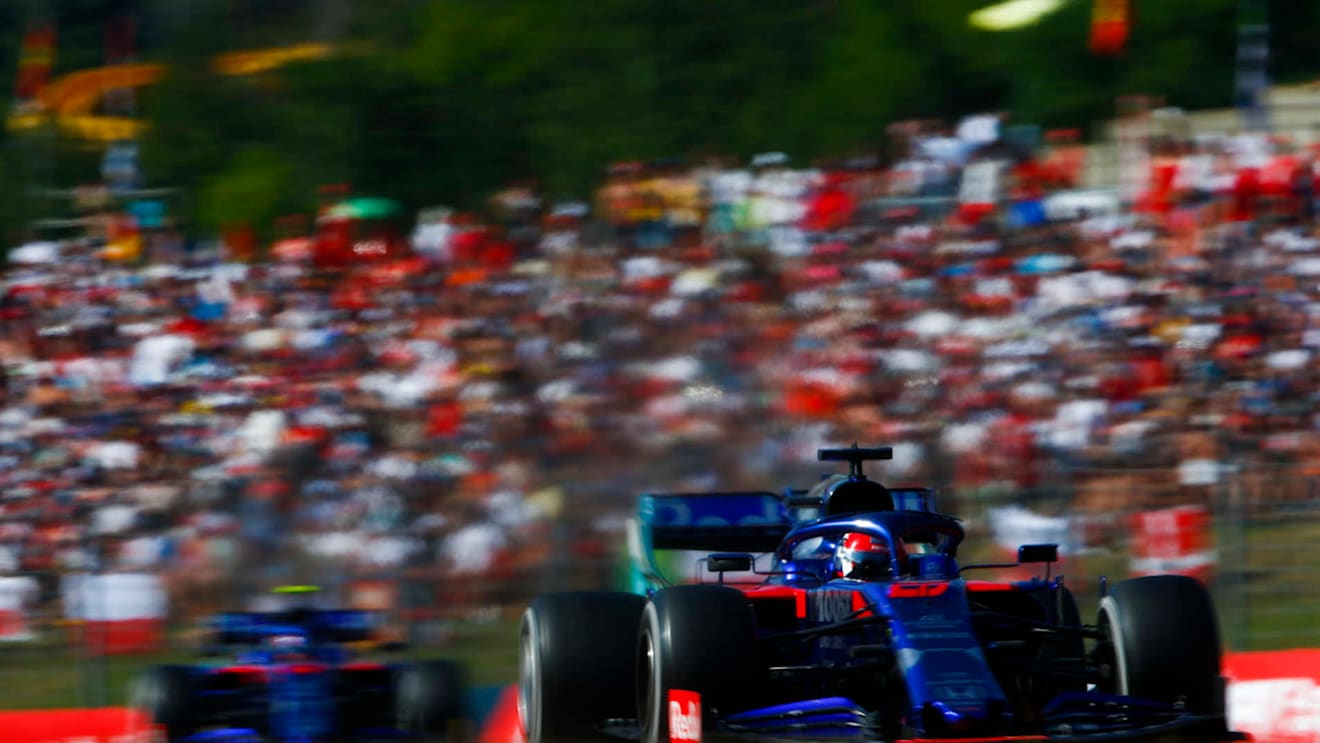 HUNGARORING, HUNGARY - AUGUST 04: Daniil Kvyat, Toro Rosso STR14 leads Alexander Albon, Toro Rosso STR14 during the Hungarian GP at Hungaroring on August 04, 2019 in Hungaroring, Hungary. (Photo by Andy Hone / LAT Images)