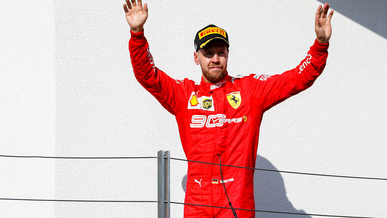 HUNGARORING, HUNGARY - AUGUST 04: Sebastian Vettel, Ferrari, 3rd position, arrives on the podium during the Hungarian GP at Hungaroring on August 04, 2019 in Hungaroring, Hungary. (Photo by Zak Mauger / LAT Images)