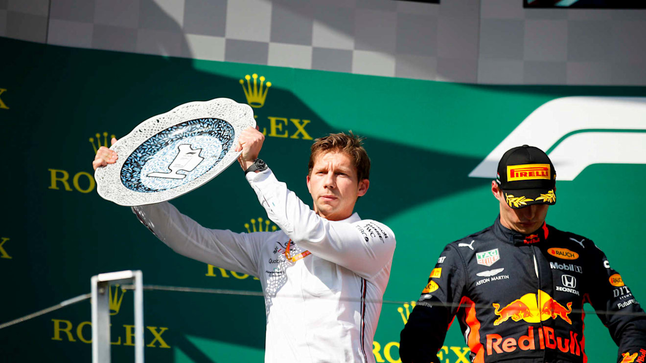 HUNGARORING, HUNGARY - AUGUST 04: Matt Deane, Chief Mechanic, Mercedes AMG, receives the Constructors trophy for Mercedes alongside Max Verstappen, Red Bull Racing, 2nd position during the Hungarian GP at Hungaroring on August 04, 2019 in Hungaroring, Hungary. (Photo by Joe Portlock / LAT Images)