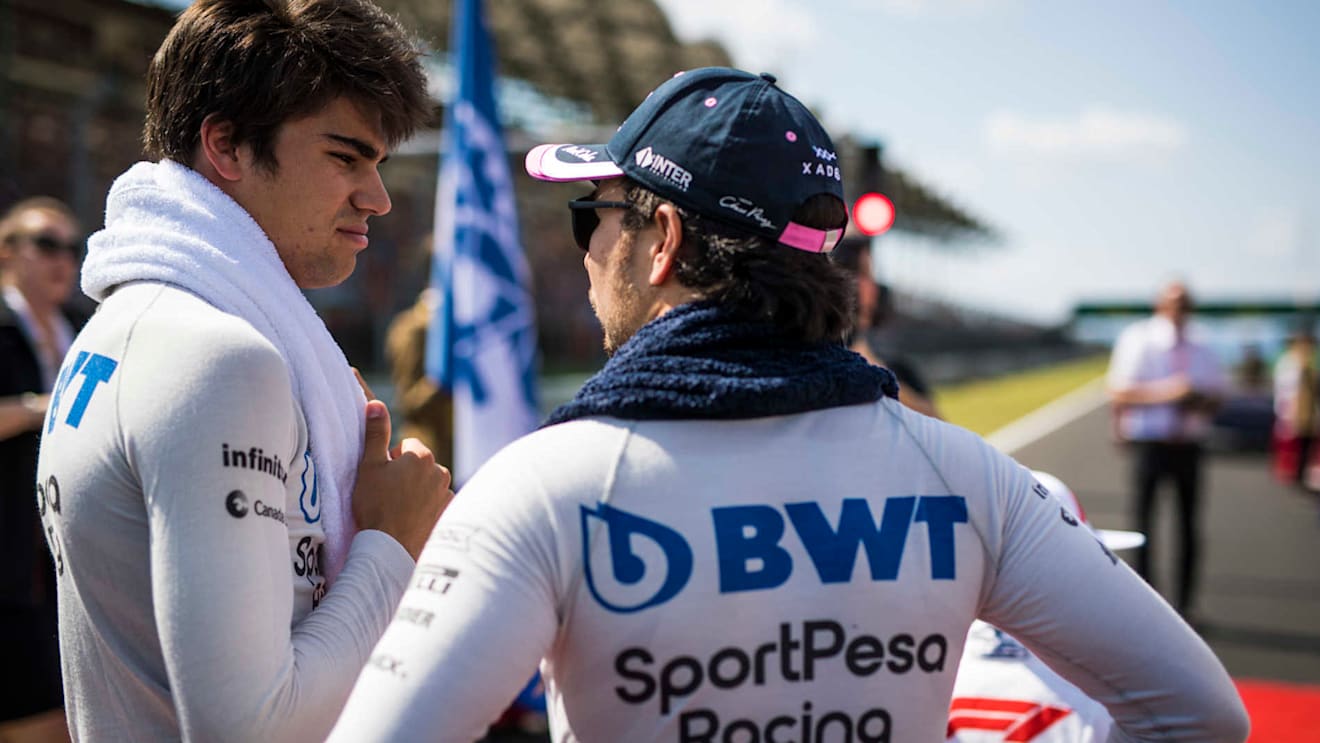 HUNGARORING, HUNGARY - AUGUST 04: Lance Stroll, Racing Point, and Sergio Perez, Racing Point during the Hungarian GP at Hungaroring on August 04, 2019 in Hungaroring, Hungary. (Photo by Sam Bloxham / LAT Images)