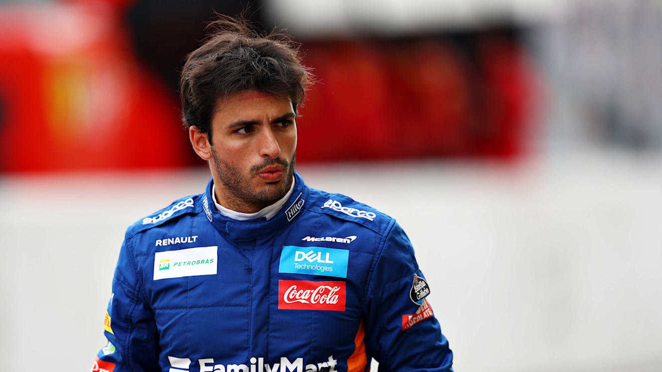 SUZUKA, JAPAN - OCTOBER 11: Carlos Sainz of Spain and McLaren F1 walks in the Pitlane during practice for the F1 Grand Prix of Japan at Suzuka Circuit on October 11, 2019 in Suzuka, Japan. (Photo by Mark Thompson/Getty Images)