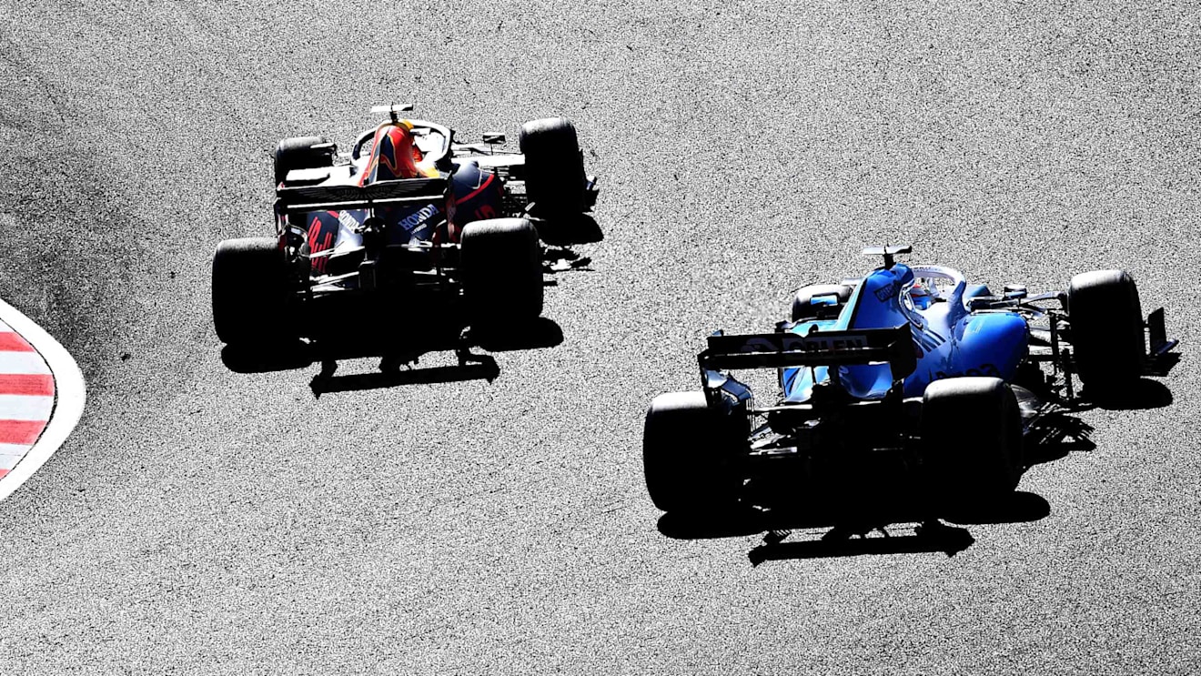 SUZUKA, JAPAN - OCTOBER 13: Max Verstappen of the Netherlands driving the (33) Aston Martin Red Bull Racing RB15 leads George Russell of Great Britain driving the (63) Rokit Williams Racing FW42 Mercedes on track during the F1 Grand Prix of Japan at Suzuka Circuit on October 13, 2019 in Suzuka, Japan. (Photo by Clive Mason/Getty Images)
