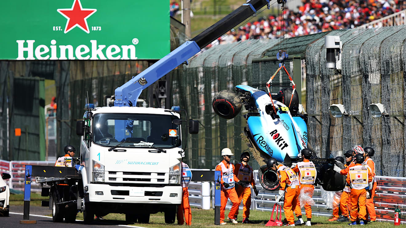 SUZUKA, JAPAN - OCTOBER 13: The car of Robert Kubica of Poland and Williams is removed from the circuit after he crashed during qualifying for the F1 Grand Prix of Japan at Suzuka Circuit on October 13, 2019 in Suzuka, Japan. (Photo by Charles Coates/Getty Images)