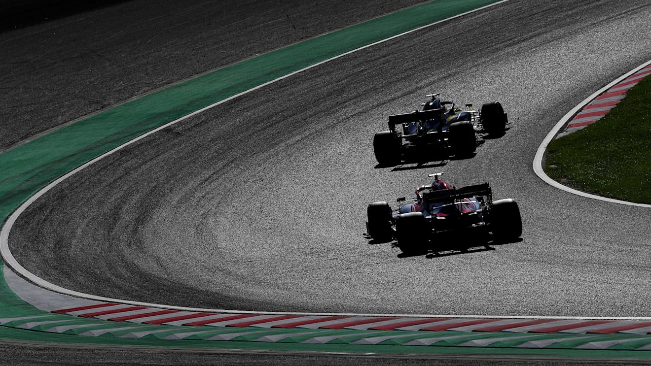 SUZUKA, JAPAN - OCTOBER 13: Daniel Ricciardo of Australia driving the (3) Renault Sport Formula One Team RS19 leads Kimi Raikkonen of Finland driving the (7) Alfa Romeo Racing C38 Ferrari on track during the F1 Grand Prix of Japan at Suzuka Circuit on October 13, 2019 in Suzuka, Japan. (Photo by Mark Thompson/Getty Images)