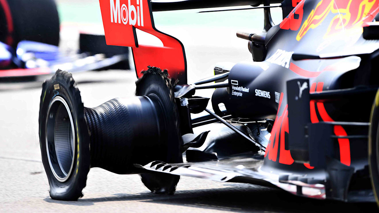 MEXICO CITY, MEXICO - OCTOBER 27: Max Verstappen of the Netherlands driving the (33) Aston Martin Red Bull Racing RB15 loses his right rear tyre to a puncture during the F1 Grand Prix of Mexico at Autodromo Hermanos Rodriguez on October 27, 2019 in Mexico City, Mexico. (Photo by Clive Mason/Getty Images)