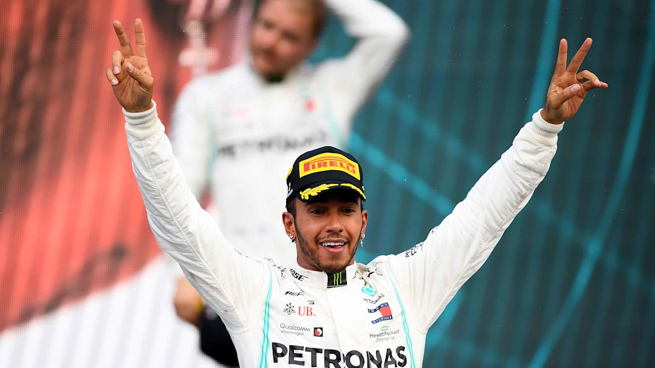 MEXICO CITY, MEXICO - OCTOBER 27: Race winner Lewis Hamilton of Great Britain and Mercedes GP celebrates on the podium during the F1 Grand Prix of Mexico at Autodromo Hermanos Rodriguez on October 27, 2019 in Mexico City, Mexico. (Photo by Clive Mason/Getty Images)