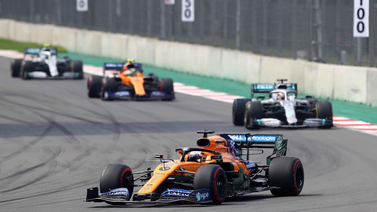 MEXICO CITY, MEXICO - OCTOBER 27: Carlos Sainz of Spain driving the (55) McLaren F1 Team MCL34 Renault leads Lewis Hamilton of Great Britain driving the (44) Mercedes AMG Petronas F1 Team Mercedes W10 on track during the F1 Grand Prix of Mexico at Autodromo Hermanos Rodriguez on October 27, 2019 in Mexico City, Mexico. (Photo by Mark Thompson/Getty Images)
