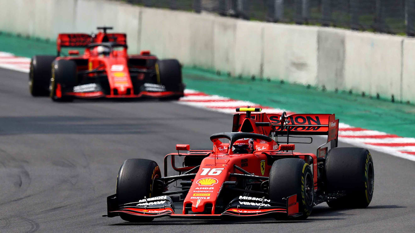 MEXICO CITY, MEXICO - OCTOBER 27: Charles Leclerc of Monaco driving the (16) Scuderia Ferrari SF90 leads Sebastian Vettel of Germany driving the (5) Scuderia Ferrari SF90 on track during the F1 Grand Prix of Mexico at Autodromo Hermanos Rodriguez on October 27, 2019 in Mexico City, Mexico. (Photo by Mark Thompson/Getty Images)