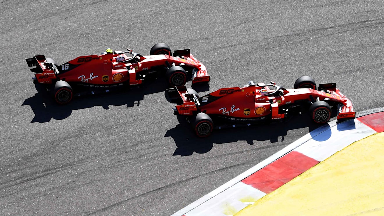 SOCHI, RUSSIA - SEPTEMBER 29: Sebastian Vettel of Germany driving the (5) Scuderia Ferrari SF90 and Charles Leclerc of Monaco driving the (16) Scuderia Ferrari SF90 battle for position at the start during the F1 Grand Prix of Russia at Sochi Autodrom on September 29, 2019 in Sochi, Russia. (Photo by Clive Mason/Getty Images)
