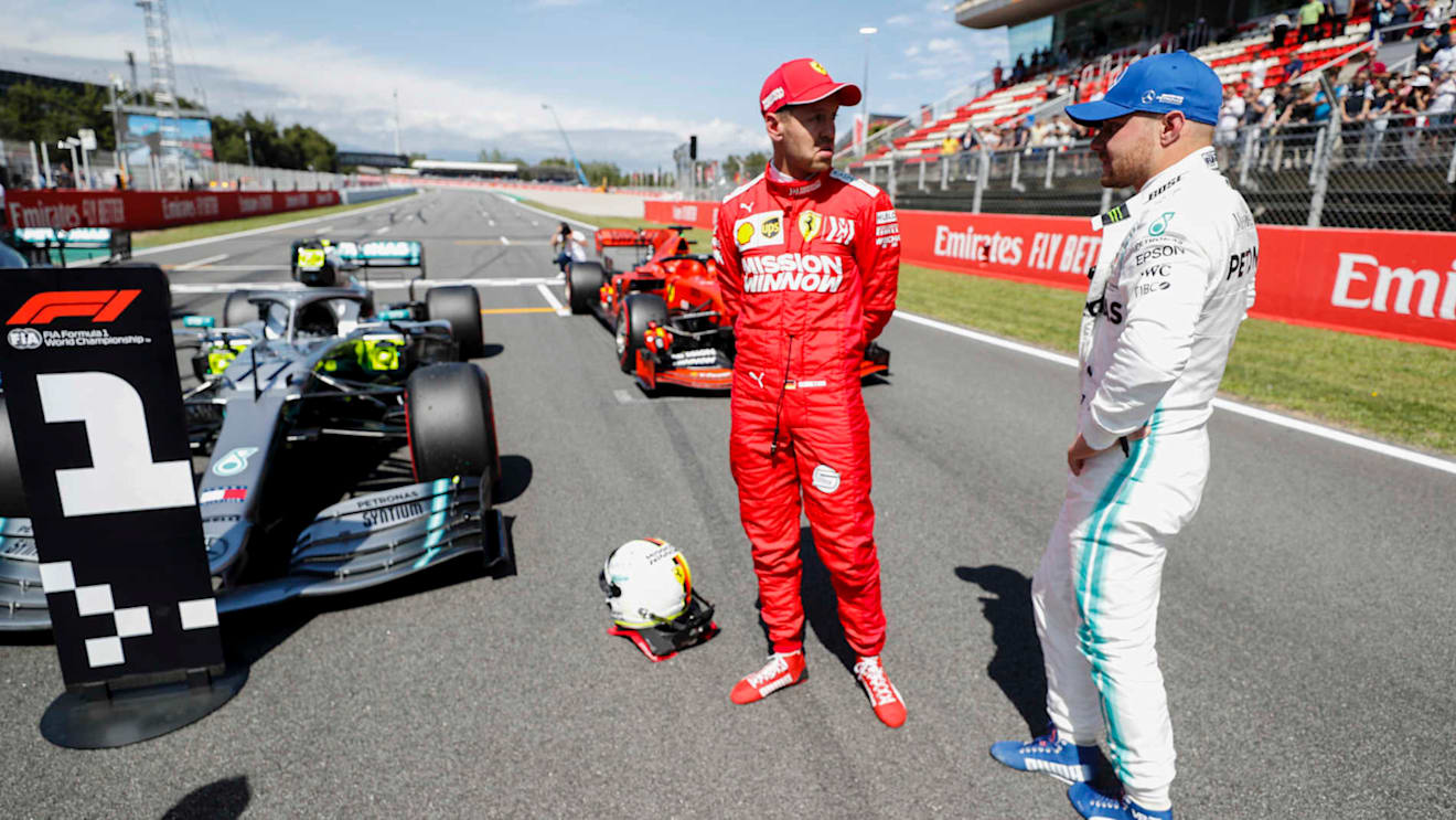CIRCUIT DE BARCELONA-CATALUNYA, SPAIN - MAY 11: Sebastian Vettel, Ferrari and Pole Sitter Valtteri Bottas, Mercedes AMG F1 talk in Parc Ferme during the Spanish GP at Circuit de Barcelona-Catalunya on May 11, 2019 in Circuit de Barcelona-Catalunya, Spain. (Photo by Steven Tee / LAT Images)