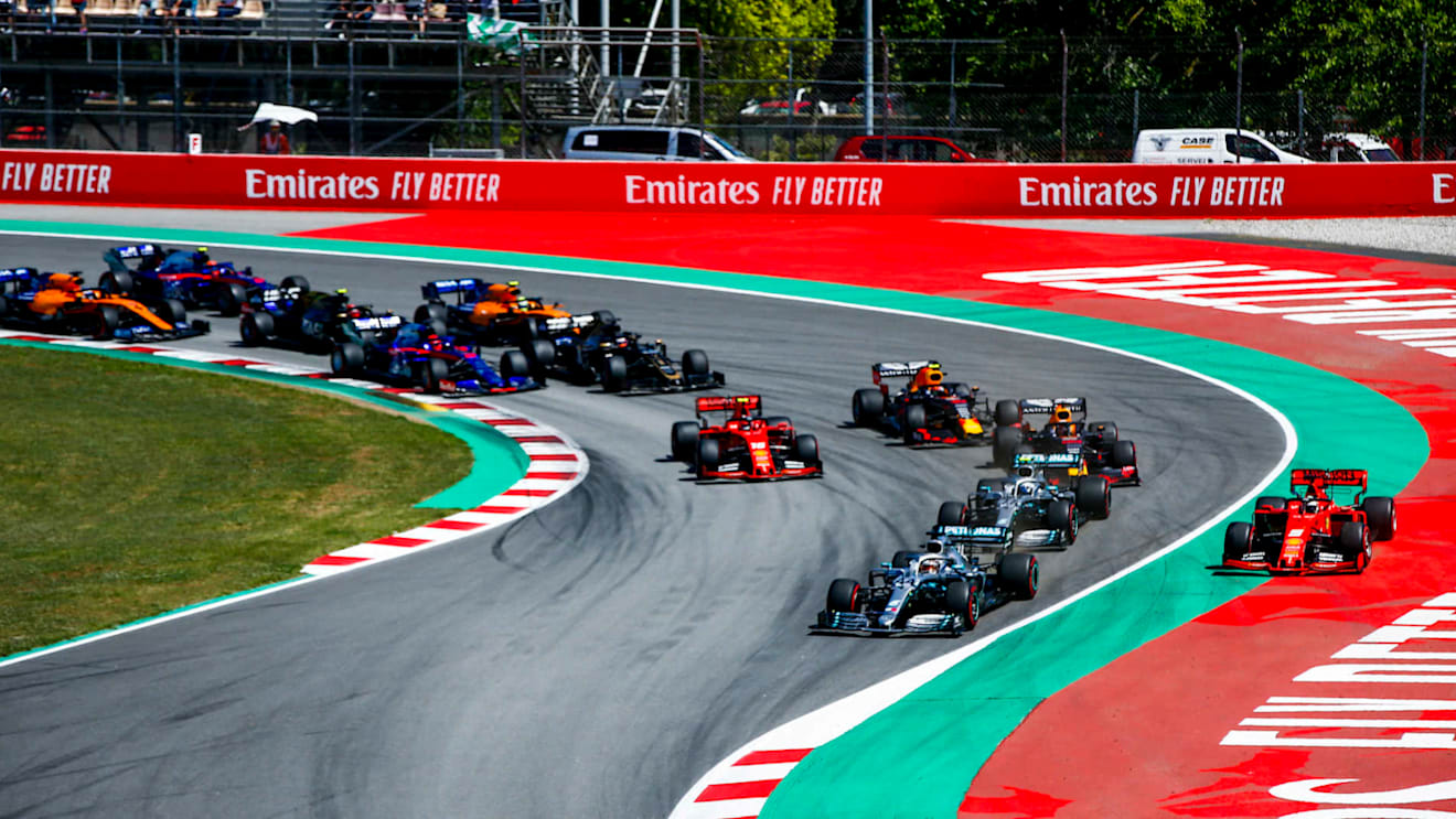 CIRCUIT DE BARCELONA-CATALUNYA, SPAIN - MAY 12: Lewis Hamilton, Mercedes AMG F1 W10, leads Valtteri Bottas, Mercedes AMG W10 into the first corner as Sebastian Vettel, Ferrari SF90 runs wide ahead of Max Verstappen, Red Bull Racing RB15, Charles Leclerc, Ferrari SF90, Pierre Gasly, Red Bull Racing RB15, and the rest of the field during the Spanish GP at Circuit de Barcelona-Catalunya on May 12, 2019 in Circuit de Barcelona-Catalunya, Spain. (Photo by Andy Hone / LAT Images)