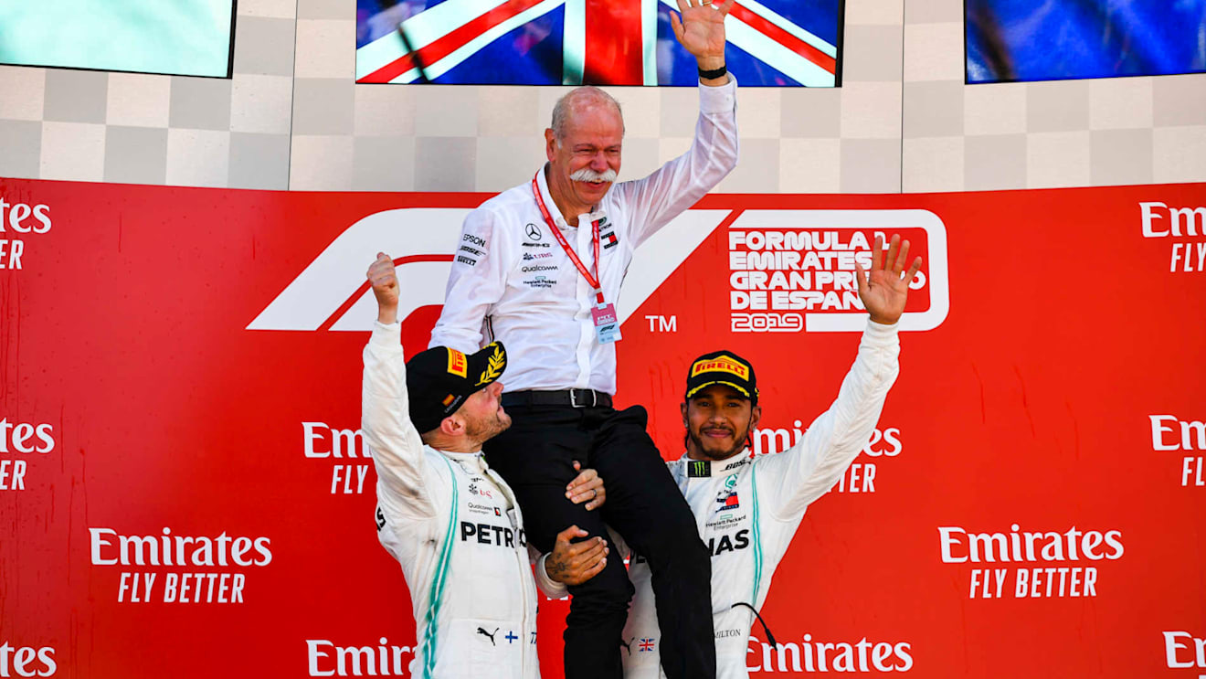 CIRCUIT DE BARCELONA-CATALUNYA, SPAIN - MAY 12: Valtteri Bottas, Mercedes AMG F1, 2nd position, and Lewis Hamilton, Mercedes AMG F1, 1st position, lift Dr Dieter Zetsche, CEO, Mercedes Benz, on their shoulders on the podium during the Spanish GP at Circuit de Barcelona-Catalunya on May 12, 2019 in Circuit de Barcelona-Catalunya, Spain. (Photo by Mark Sutton / Sutton Images)