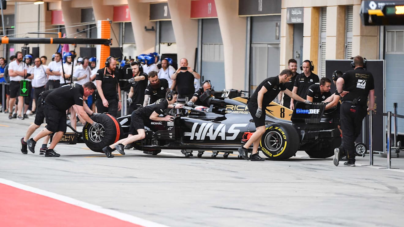 BAHRAIN INTERNATIONAL CIRCUIT, BAHRAIN - APRIL 02: Romain Grosjean, Haas VF-19, returns to the garage during the Bahrain April testing at Bahrain International Circuit on April 02, 2019 in Bahrain International Circuit, Bahrain. (Photo by Mark Sutton / Sutton Images)