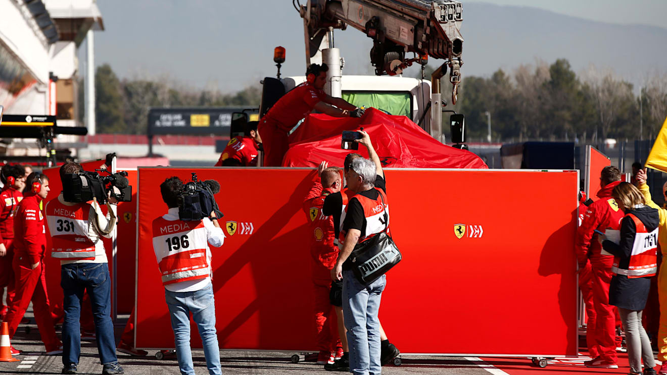 CIRCUIT DE BARCELONA-CATALUNYA, SPAIN - FEBRUARY 27: The car of Sebastian Vettel, Ferrari SF90 is revovered to the garage shielded by screens during the Barcelona February testing II at Circuit de Barcelona-Catalunya on February 27, 2019 in Circuit de Barcelona-Catalunya, Spain. (Photo by Andy Hone / LAT Images)