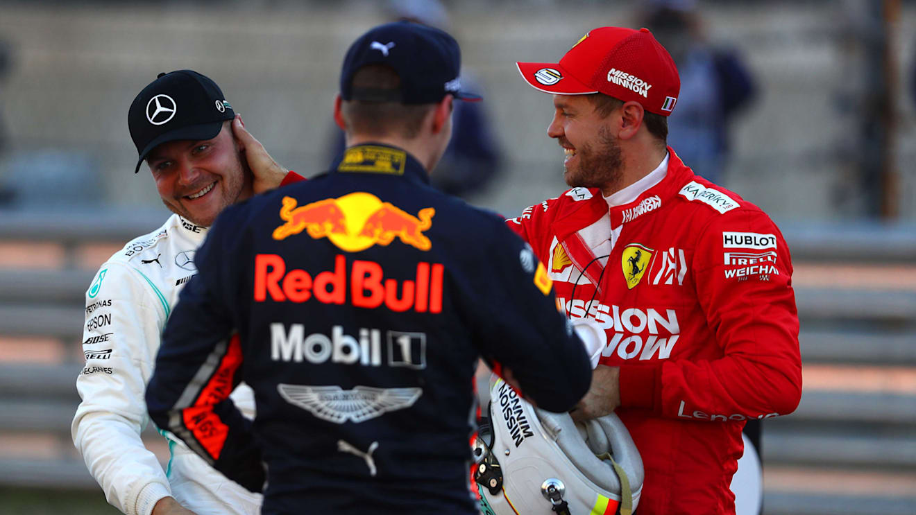 AUSTIN, TEXAS - NOVEMBER 02: Top three qualifiers Valtteri Bottas of Finland and Mercedes GP, Sebastian Vettel of Germany and Ferrari and Max Verstappen of Netherlands and Red Bull Racing celebrate in parc ferme during qualifying for the F1 Grand Prix of USA at Circuit of The Americas on November 02, 2019 in Austin, Texas. (Photo by Mark Thompson/Getty Images)
