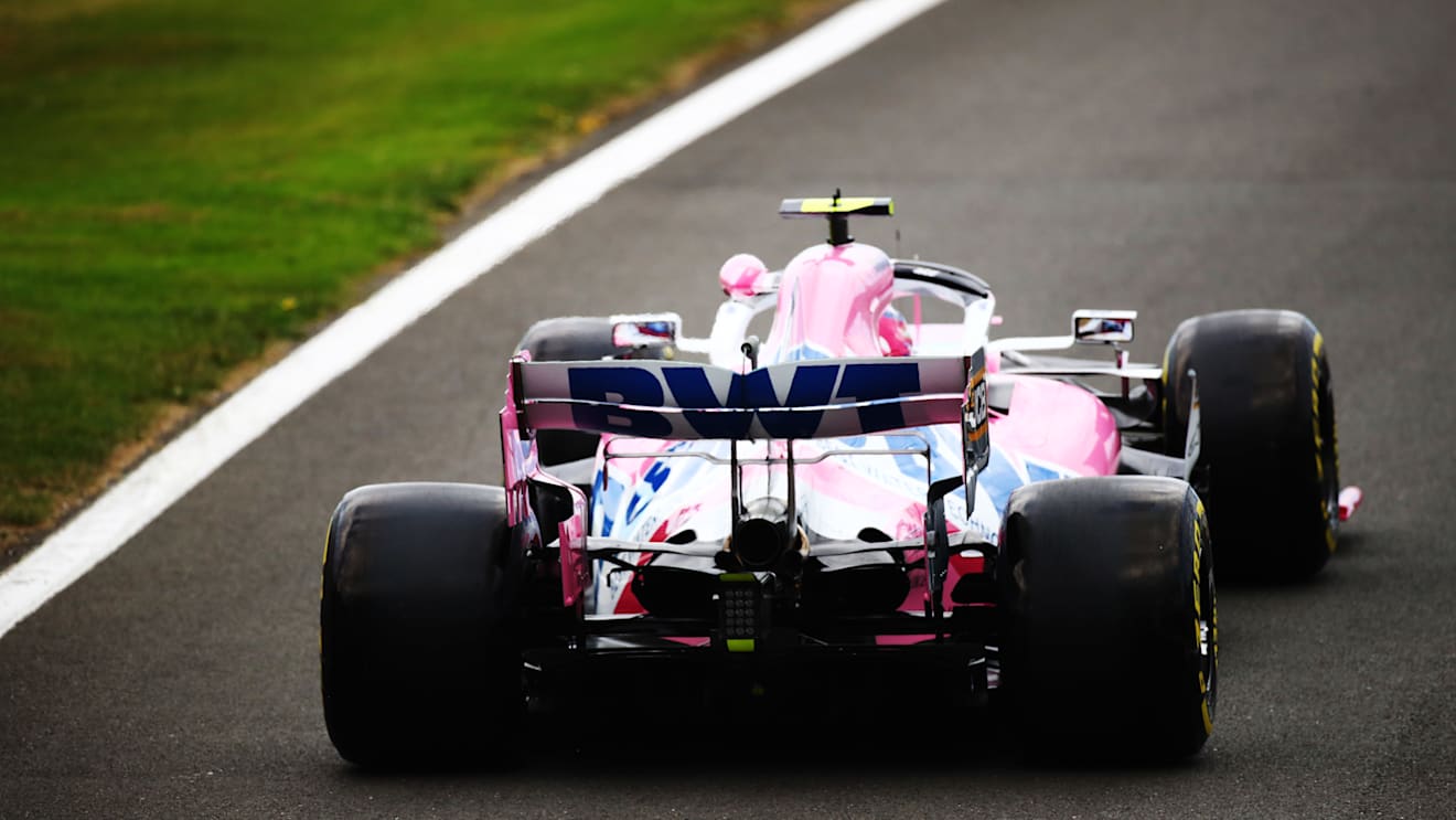 NORTHAMPTON, ENGLAND - AUGUST 07: Lance Stroll of Canada driving the (18) Racing Point RP20 Mercedes drives in the pit lane during practice for the F1 70th Anniversary Grand Prix at Silverstone on August 07, 2020 in Northampton, England. (Photo by Bryn Lennon/Getty Images)