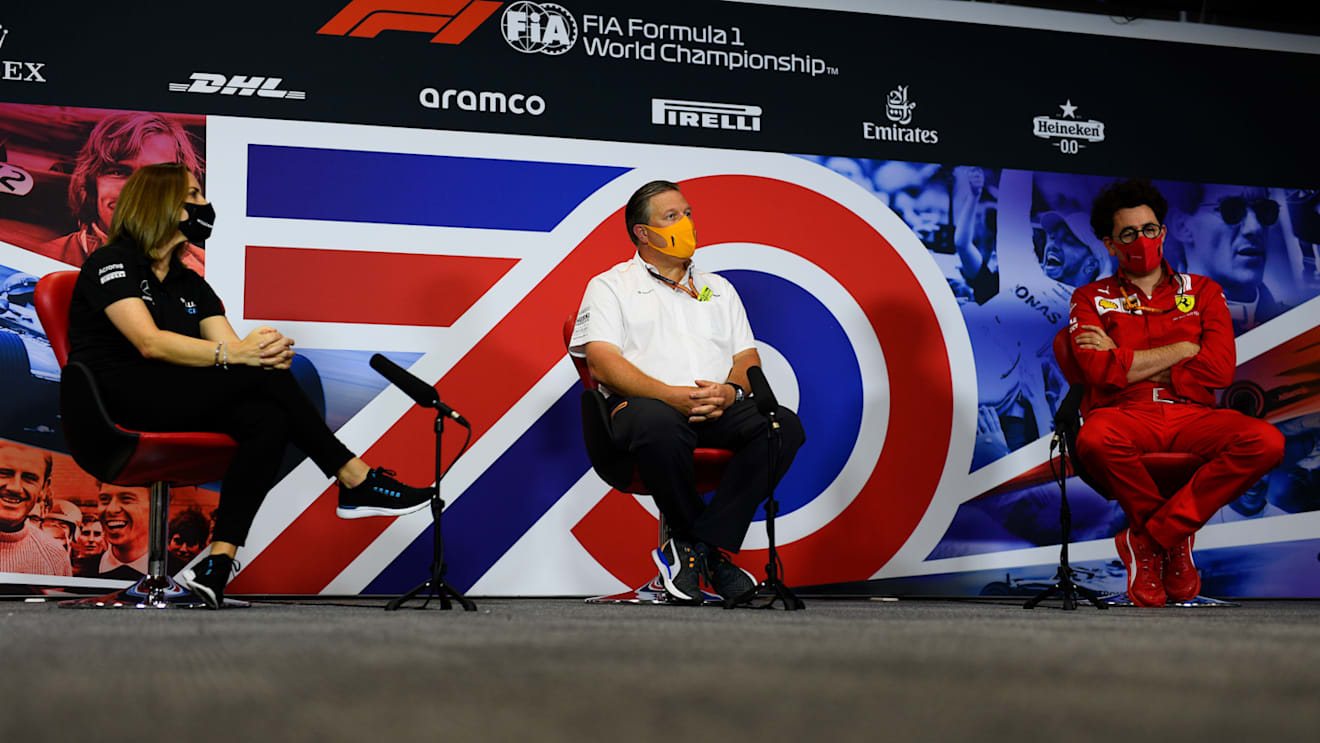 NORTHAMPTON, ENGLAND - AUGUST 07: Williams Deputy Team Principal Claire Williams (L), McLaren Chief Executive Officer Zak Brown (C) and Scuderia Ferrari Team Principal Mattia Binotto (R) talk in the Team Principals Press Conference during practice for the F1 70th Anniversary Grand Prix at Silverstone on August 07, 2020 in Northampton, England. (Photo by Rudy Carezzevoli/Getty Images)