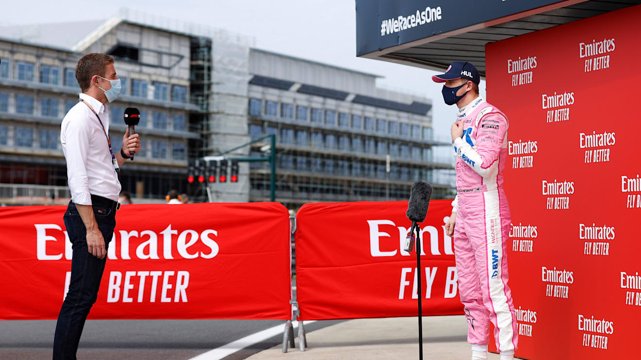 NORTHAMPTON, ENGLAND - AUGUST 08: Third placed qualifier Nico Hulkenberg of Germany and Racing Point is interviewed by Sky Sports presenter and former F1 driver Paul di Resta in parc ferme during qualifying for the F1 70th Anniversary Grand Prix at Silverstone on August 08, 2020 in Northampton, England. (Photo by Andrew Boyers/Pool via Getty Images)