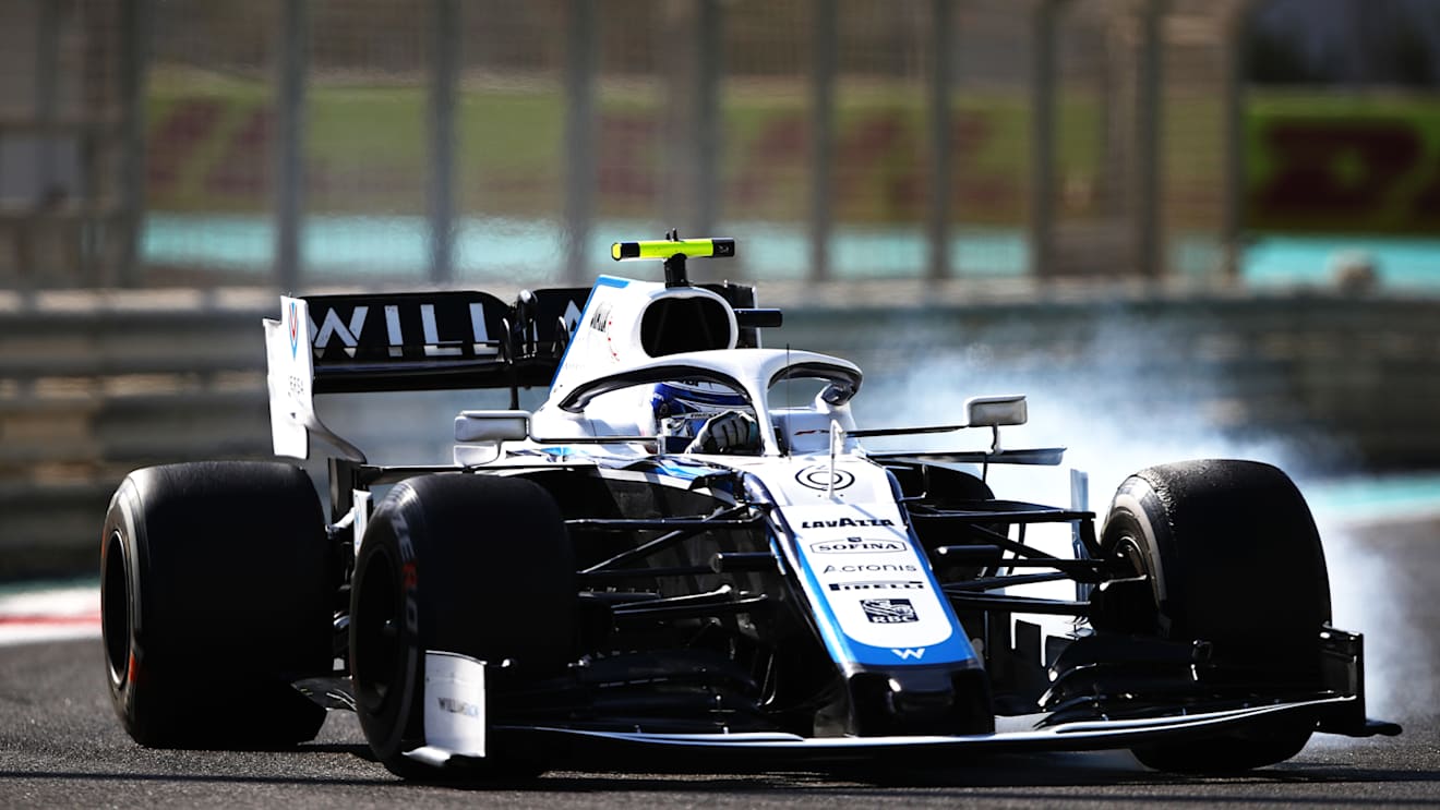 ABU DHABI, UNITED ARAB EMIRATES - DECEMBER 11: Nicholas Latifi of Canada driving the (6) Williams Racing FW43 Mercedes locks up during practice ahead of the F1 Grand Prix of Abu Dhabi at Yas Marina Circuit on December 11, 2020 in Abu Dhabi, United Arab Emirates. (Photo by Bryn Lennon/Getty Images)