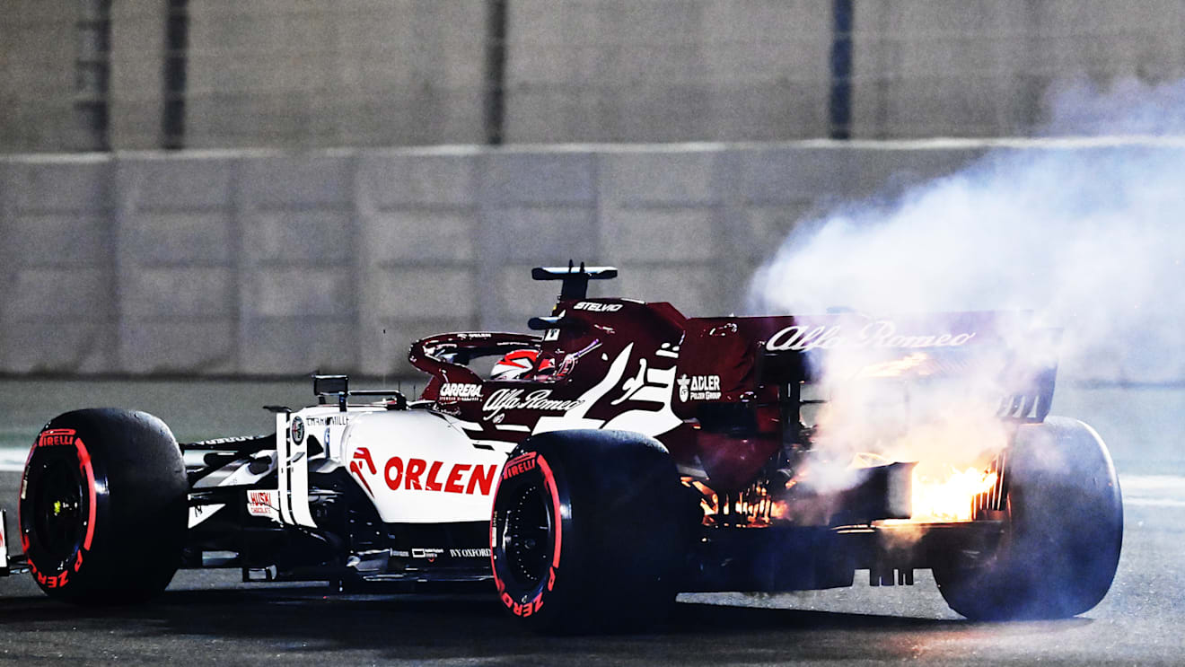 ABU DHABI, UNITED ARAB EMIRATES - DECEMBER 11: Fire emerges from the car of Kimi Raikkonen of Finland driving the (7) Alfa Romeo Racing C39 Ferrari during practice ahead of the F1 Grand Prix of Abu Dhabi at Yas Marina Circuit on December 11, 2020 in Abu Dhabi, United Arab Emirates. (Photo by Getty Images/Getty Images)