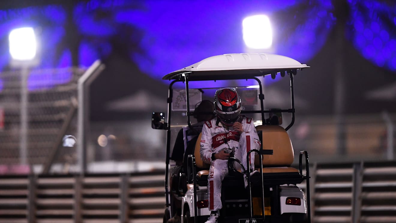ABU DHABI, UNITED ARAB EMIRATES - DECEMBER 11: Kimi Raikkonen of Finland and Alfa Romeo Racing is given a lift back to the pits after stopping on track during practice ahead of the F1 Grand Prix of Abu Dhabi at Yas Marina Circuit on December 11, 2020 in Abu Dhabi, United Arab Emirates. (Photo by Rudy Carezzevoli/Getty Images)