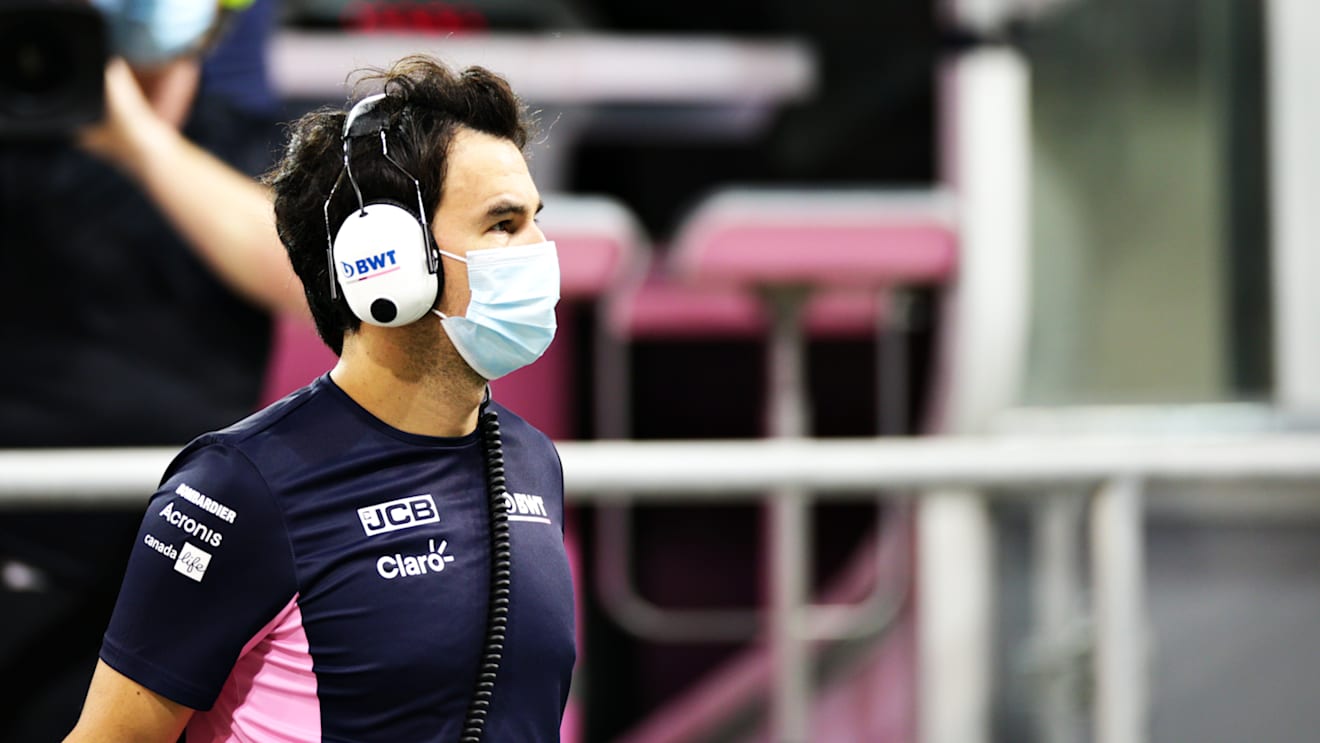 ABU DHABI, UNITED ARAB EMIRATES - DECEMBER 13: Sergio Perez of Mexico and Racing Point looks on from the pitlane after retiring during the F1 Grand Prix of Abu Dhabi at Yas Marina Circuit on December 13, 2020 in Abu Dhabi, United Arab Emirates. (Photo by Peter Fox/Getty Images)