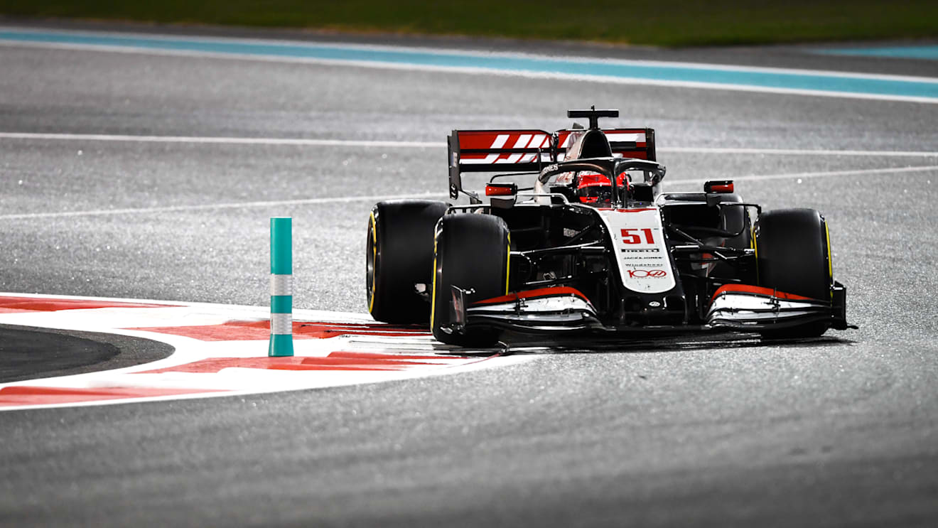 ABU DHABI, UNITED ARAB EMIRATES - DECEMBER 13: Pietro Fittipaldi of Brazil driving the (51) Haas F1 Team VF-20 Ferrari during the F1 Grand Prix of Abu Dhabi at Yas Marina Circuit on December 13, 2020 in Abu Dhabi, United Arab Emirates. (Photo by Rudy Carezzevoli/Getty Images)