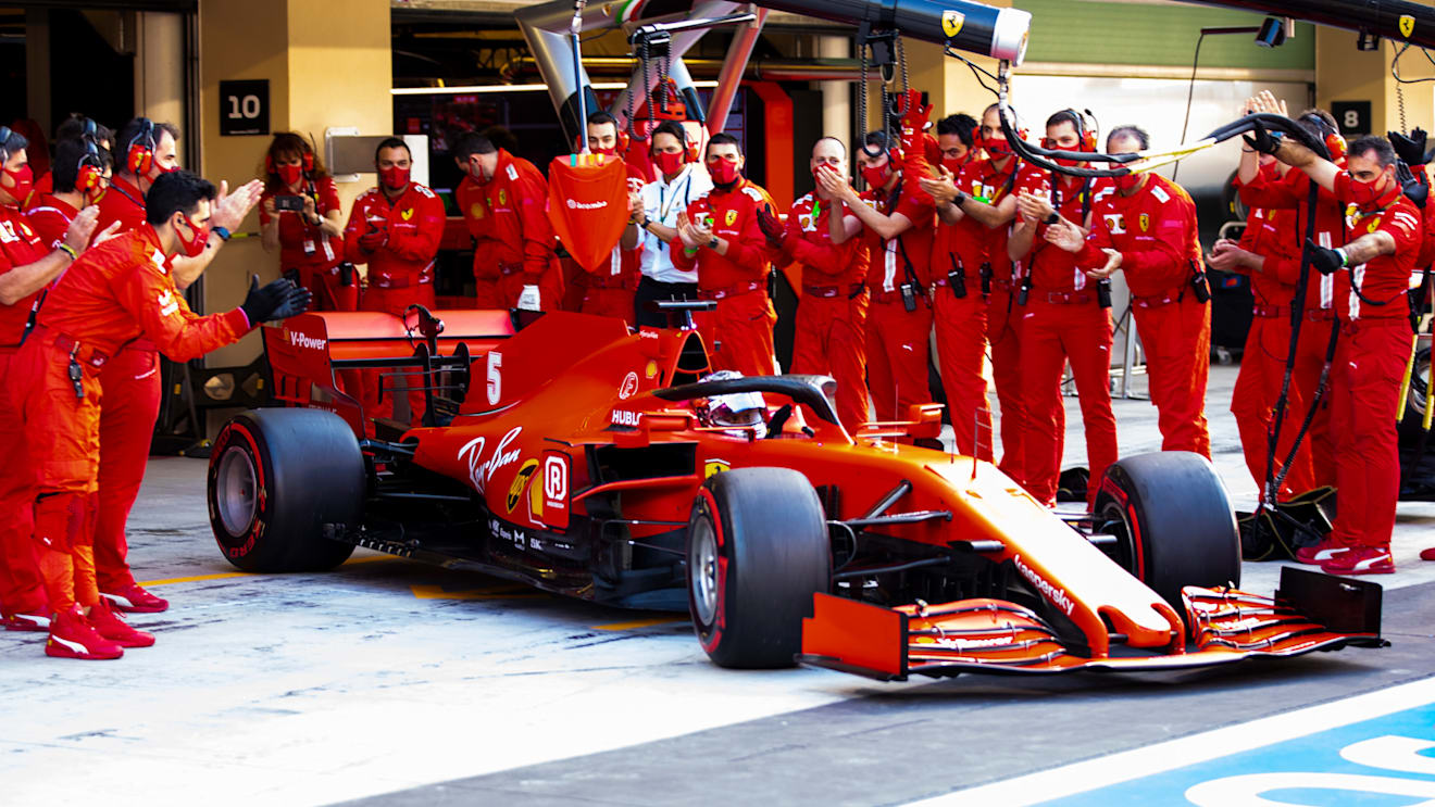 ABU DHABI, UNITED ARAB EMIRATES - DECEMBER 13: The Ferrari team applaud as Sebastian Vettel of Germany driving the (5) Scuderia Ferrari SF1000 leaves the garage for his final race for the team prior to the F1 Grand Prix of Abu Dhabi at Yas Marina Circuit on December 13, 2020 in Abu Dhabi, United Arab Emirates. (Photo by Mark Thompson/Getty Images)