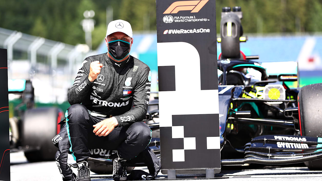 SPIELBERG, AUSTRIA - JULY 04: Pole position qualifier Valtteri Bottas of Finland and Mercedes GP celebrates in parc ferme during qualifying for the Formula One Grand Prix of Austria at Red Bull Ring on July 04, 2020 in Spielberg, Austria. (Photo by Dan Istitene - Formula 1/Formula 1 via Getty Images)